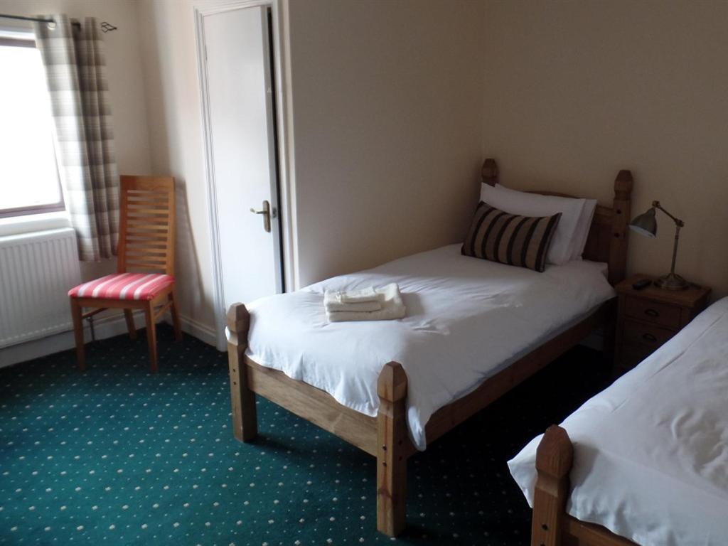 Hotel Royal George à Great Easton  Chambre photo